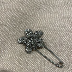 Antique silver and diamond flower brooch.